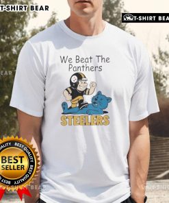 Top Pittsburgh Steelers t-shirt featuring the 'Beat The Carolina Panthers' stomp mascot design for fans.