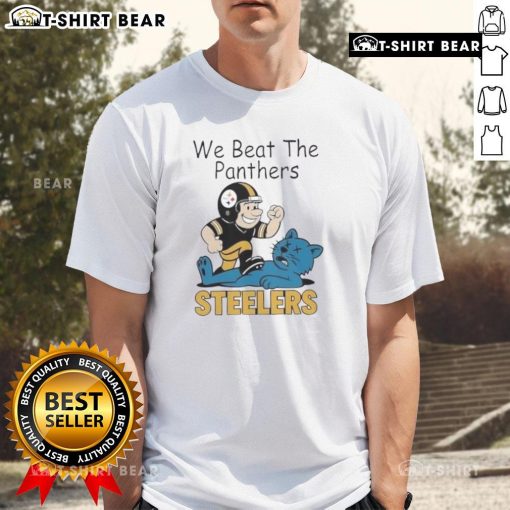Top Pittsburgh Steelers t-shirt featuring the 'Beat The Carolina Panthers' stomp mascot design for fans.