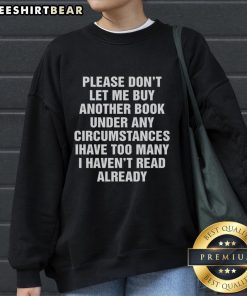 Cozy 'Please Don't Let Me Buy Any More Books' sweatshirt, perfect for book lovers and cozy reading sessions.