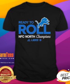 Alt Text: Top Ready To Roll Detroit Lions NFC North Champions T-Shirt featuring team colors and logo, perfect for fans.