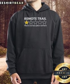 Person wearing 'Top Remote Trail One Star There's No Taco Place Out Here' hoodie in a scenic outdoor trail setting.