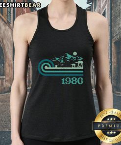 Retro vintage 1980 tank top featuring bold graphics and vibrant colors, perfect for nostalgic fashion enthusiasts.