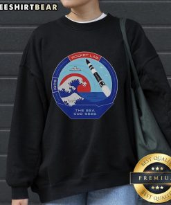 Top Rocket Lab The Sea God Sees Outer Space mission patch sweatshirt featuring vibrant design and space-themed graphics.