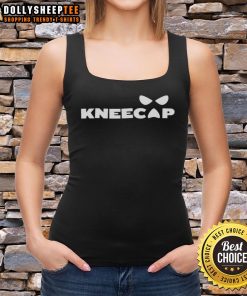 Top Sami Zayn wearing a stylish knapsack tank top, showcasing his unique wrestling fashion and personality.