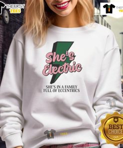 Alt Text: Top She's Electric sweatshirt featuring a quirky design, perfect for fans of eccentric family apparel.