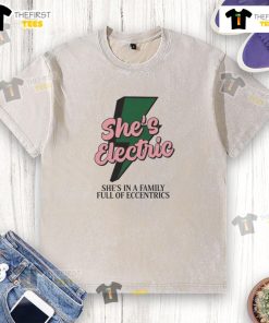 Alt Text: Top She's Electric She's in a Family Full of Eccentrics washed t-shirt featuring vibrant graphics and a relaxed fit.