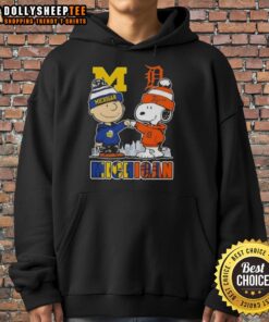 Top Snoopy and Charlie Brown Michigan Sports hoodie featuring Wolverines and Detroit Tigers skyline design.