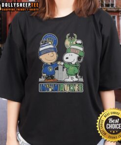 Milwaukee skyline with Snoopy and Charlie Brown graphic on a ladies' tee celebrating Brewers and Bucks sports.
