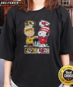 Alt Text: Ladies tee featuring Snoopy and Charlie Brown with Missouri Tigers and Kansas City Chiefs skyline design.