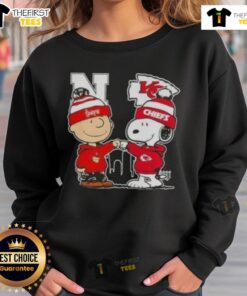 Top Snoopy and Charlie Brown Nebraska Huskers x Kansas City Chiefs skyline sweatshirt featuring vibrant graphics.