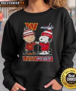 Top Snoopy and Charlie Brown sweatshirt featuring Washington Sports Commanders and Capitals skyline design.