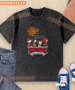 Alt Text: Top Snoopy and Friends x Wolfpack NC State sports team autumn washed t-shirt design celebrating the season.