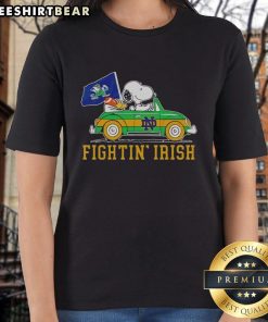 Alt Text: Snoopy and Woodstock driving a car on a Notre Dame Fighting Irish ladies tee, showcasing vibrant team spirit.