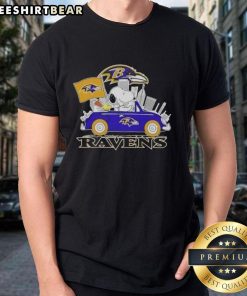 Top Snoopy driving a car on a Baltimore Ravens football T-shirt, perfect for fans and casual wear.