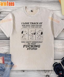 Alt Text: Snoopy graphic on a washed t-shirt, expressing the humorous struggle of daily distractions and thoughts.