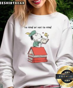 Cozy Snoopy sweatshirt featuring 'To Read or Not to Read' design, perfect for book lovers and Peanuts fans alike.