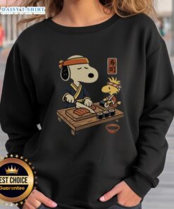 Cozy Top Snoopy Woodstock Sushi Tomodachi Club sweatshirt featuring colorful characters, perfect for fans and casual wear.