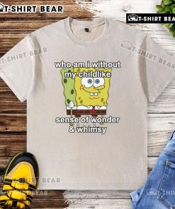 Top Sponge 'Who Am I Without My Childlike Sense Of Wonder' washed t-shirt displayed on a wooden background.