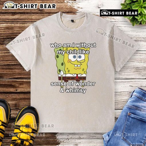 Top Sponge 'Who Am I Without My Childlike Sense Of Wonder' washed t-shirt displayed on a wooden background.