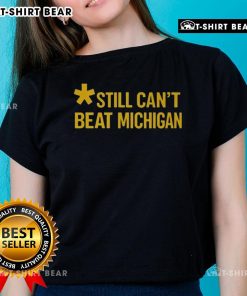 Top Still Can't Beat Michigan Ladies Tee featuring a stylish design, perfect for fans of Michigan sports.