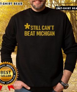 Top Still Can't Beat Michigan Sweatshirt in navy blue, featuring bold white lettering and a cozy design perfect for fans.