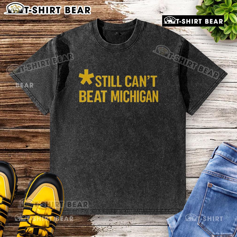 Top Still Can'T Beat Michigan Washed T Shirt Top Still Can't Beat Michigan washed t-shirt in navy blue, perfect for fans celebrating their team spirit.