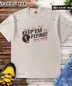 Top Texas Tech Red Raiders Football Keepem Flying flour bomb tortilla washed t-shirt displayed on a hanger.