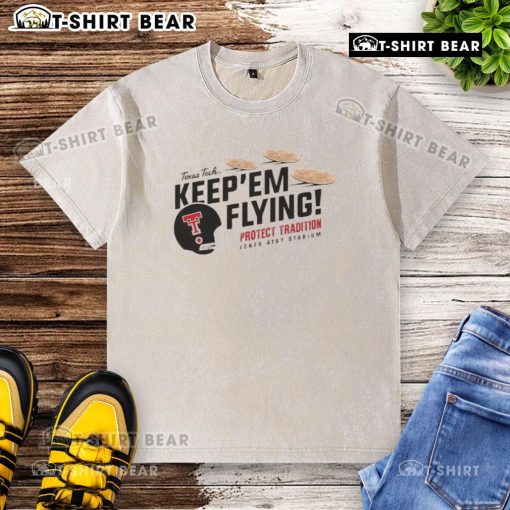 Top Texas Tech Red Raiders Football Keepem Flying flour bomb tortilla washed t-shirt displayed on a hanger.