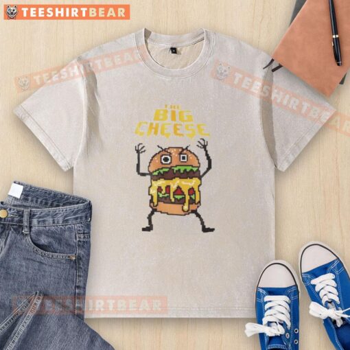 8-bit graphic of a cheeseburger on a washed t-shirt, perfect for casual wear and burger lovers. Top the Big Cheeseburger shirt.