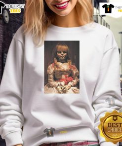 Alt Text: Top-The-Conjuring-Last-Rites-Annabelle Sweatshirt featuring spooky designs inspired by The Conjuring series.