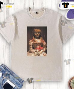 Top The Conjuring Last Rites Annabelle washed t-shirt featuring a vintage design and horror movie theme, perfect for fans.