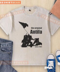 Alt Text: Top-The-Original-Antifa-Since-1941 washed t-shirt featuring bold anti-fascist graphics and comfortable fit.