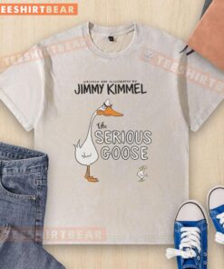 Top The Serious Goose book cover by Jimmy Kimmel on a washed t-shirt, featuring colorful illustrations and playful design.