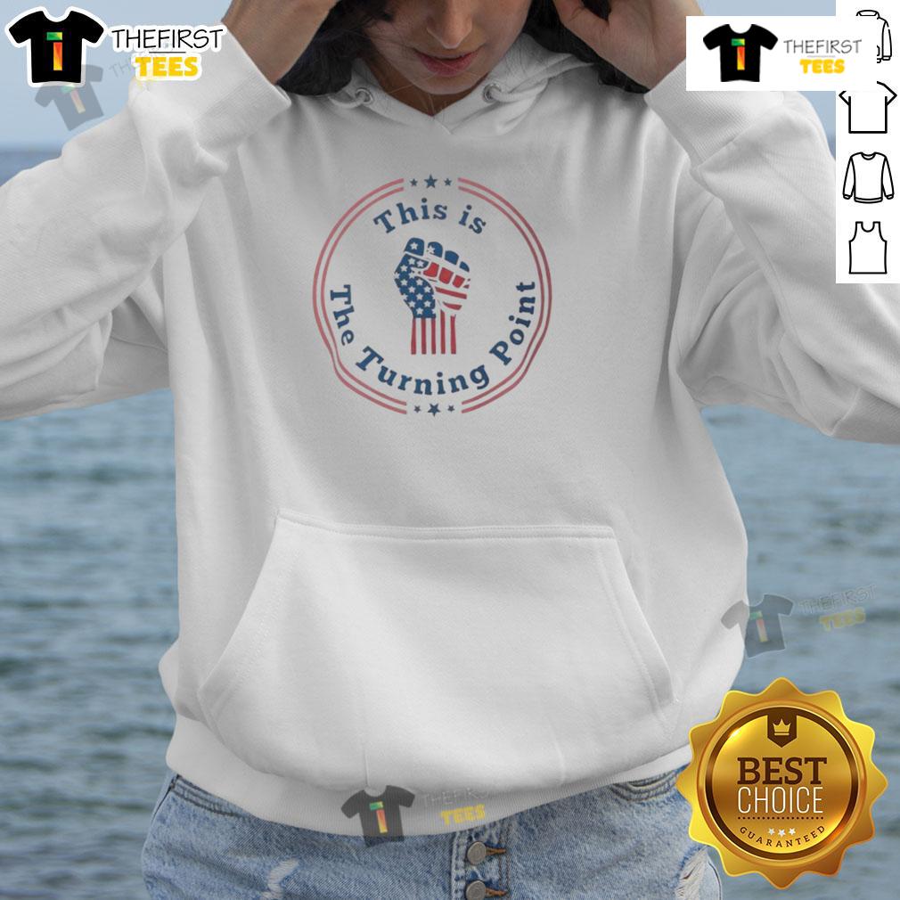 Top This Is The Turning Point Charlie Kirk Fist Us Flag Hoodie Charlie Kirk wearing a 'Top This is the Turning Point' hoodie with a fist and US flag design, symbolizing patriotism.