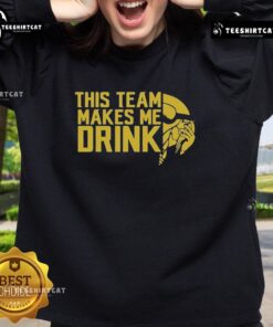 Alt Text: Minnesota Vikings logo sweatshirt from Top This Team Makes Me Drink, showcasing team spirit and style.