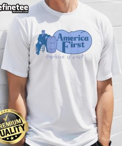 Alt Text: Top Trump America First Barrel America Is Back T-Shirt featuring bold graphics and patriotic design for supporters.