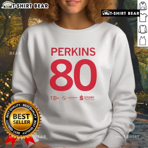 Alt Text: Stylish Top Tyler Perkins 80 sweatshirt in vibrant colors, perfect for casual wear and sports enthusiasts.
