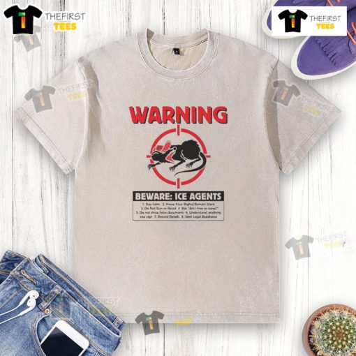 Top warning 'Beware ICE Rats' graphic on a washed t-shirt, perfect for casual wear and raising awareness about ice rats.