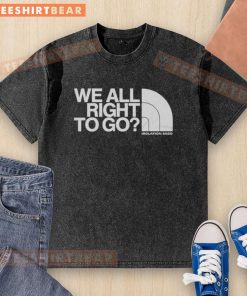 Top We Are Right To Go Isolation North Face washed t-shirt displayed on a hanger, showcasing its casual style and logo.