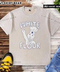Top White Flour Pillsbury Doughboy washed t-shirt featuring a playful graphic of the iconic mascot.