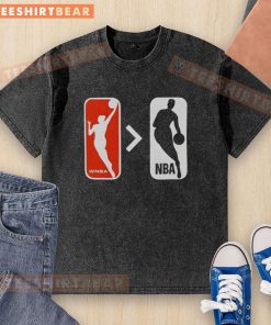 Top WNBA Is Greater Than NBA Washed T-Shirt featuring bold text design, perfect for basketball fans and advocates.