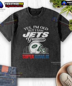 Alt Text: Vintage New York Jets Super Bowl III helmet graphic on a washed t-shirt with a city skyline design.