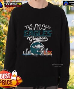 Alt Text: Vintage Philadelphia Eagles sweatshirt featuring Super Bowl helmet and skyline, perfect for fans who embrace greatness.