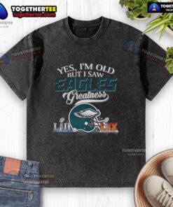 Vintage Philadelphia Eagles Super Bowl helmet graphic on a washed t-shirt, showcasing team pride and nostalgia.