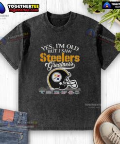 Vintage Pittsburgh Steelers Super Bowl helmet graphic on a washed t-shirt with city skyline design, perfect for fans.