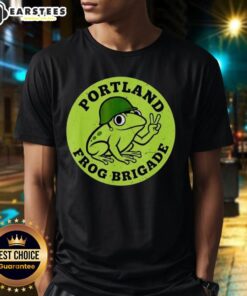 Nice Portland Frog Brigade protest T-shirt featuring a vibrant frog design and bold protest graphics for eco-activism.