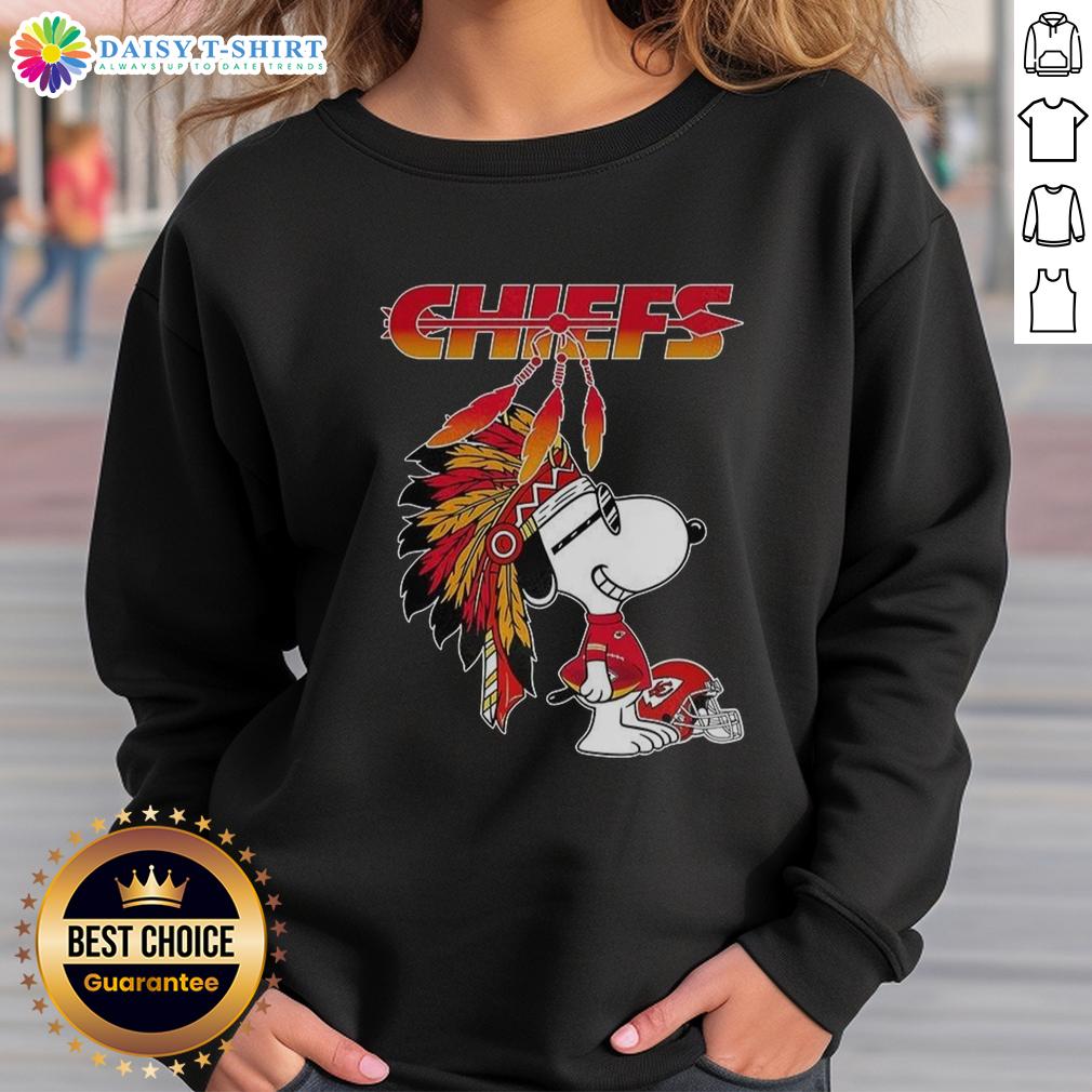 Cute Snoopy War Bonnets X Kansas City Chiefs Football Helmet Sweatshirt Alt Text: Cute Snoopy in war bonnets on Kansas City Chiefs football helmet sweatshirt, perfect for fans and cozy style lovers.