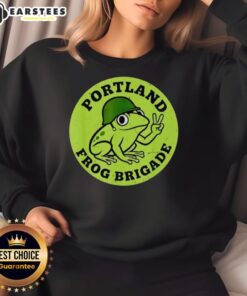 Nice Portland Frog Brigade protest sweatshirt featuring vibrant frog graphics and a bold message on activism.