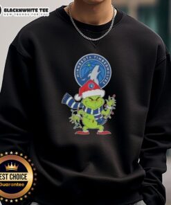 2025 Minnesota Timberwolves Christmas Grinch Santa Hat holiday sweatshirt featuring festive design and team logo.