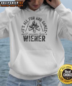 Awesome camping hoodie with playful design 'All Fun and Games Until Someone Loses a Weiner' for outdoor enthusiasts.